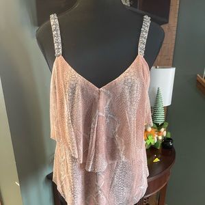 Pink tank top with stones on the straps